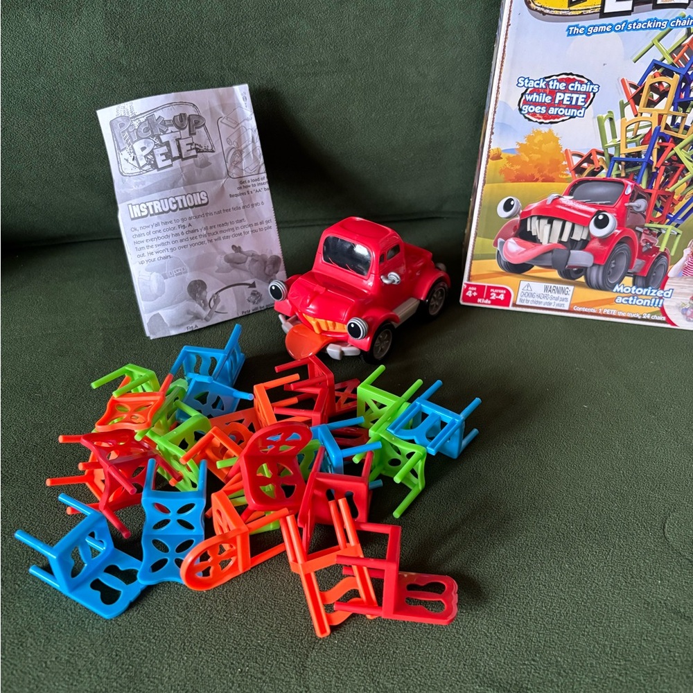 Pick Up Pete Stacking Game Toy with Box - Red Car with Multicolor Chairs